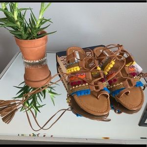 Lace up colorful flip flops